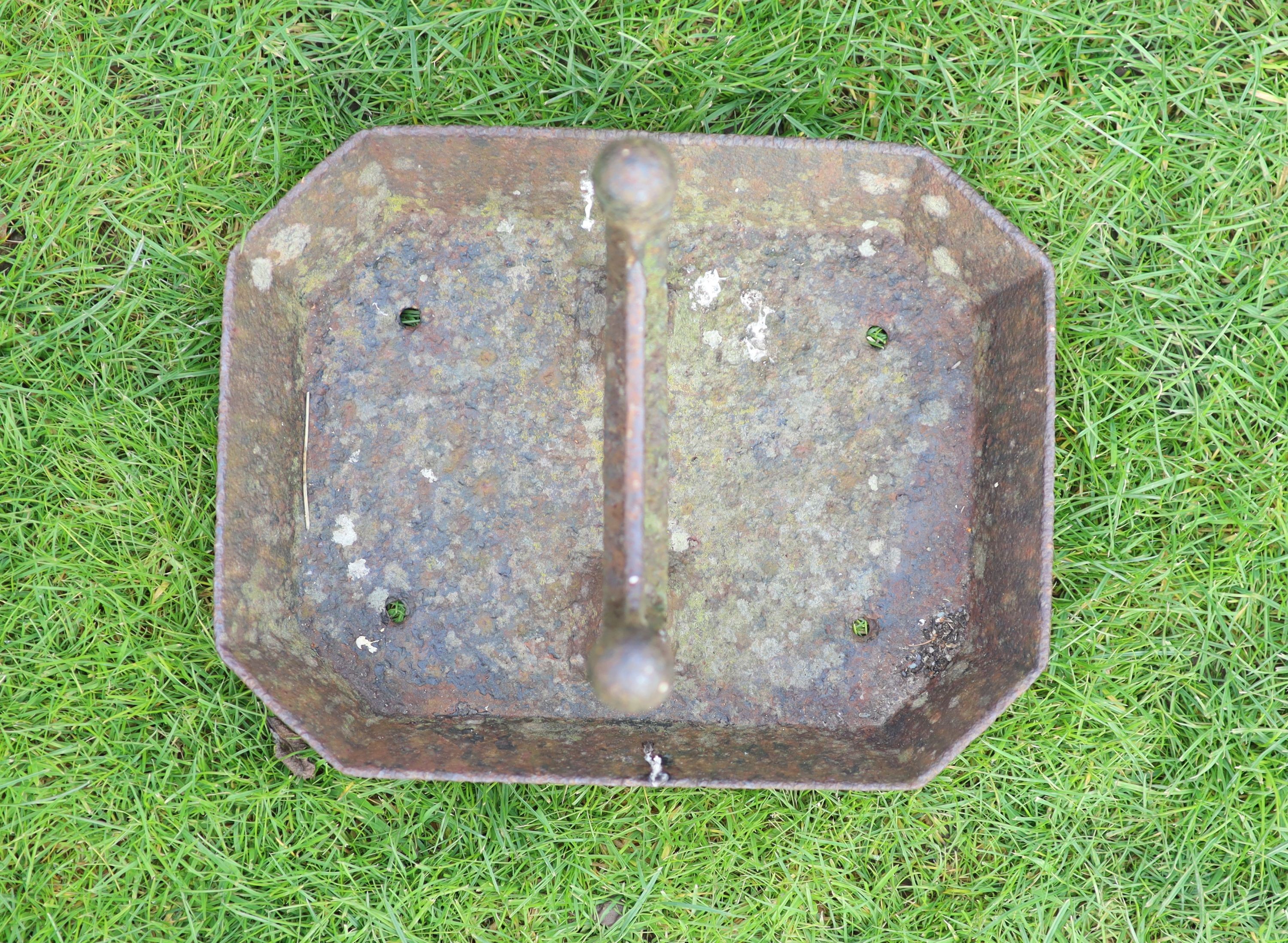 A Victorian cast iron boot scraper, 33cm